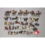 Quantity of hollowcast figures, including Cowboys & Indians, Arabs, some mounted on camels, etc,