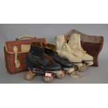 Two pairs of vintage Simlam roller skates: 'Saga' size 5 white leather roller skates with wooden