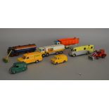 Nine unboxed Dinky Toys diecast models, with varying degrees of play wear,