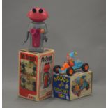 Two Marx toys: Mr Smash Clockwork Walking Martian, VG, besides detached antennae,