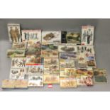 Thirty two boxed and carded military related model kits by Matchbox, Airfix, Italeri and others.