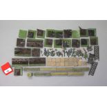 Britains Miniature Gardening, flower beds, various flowers, crazy paving and stone walls.