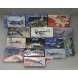 Fourteen boxed aviation related model kits by Revell, Hasegawa, Dragon and others,