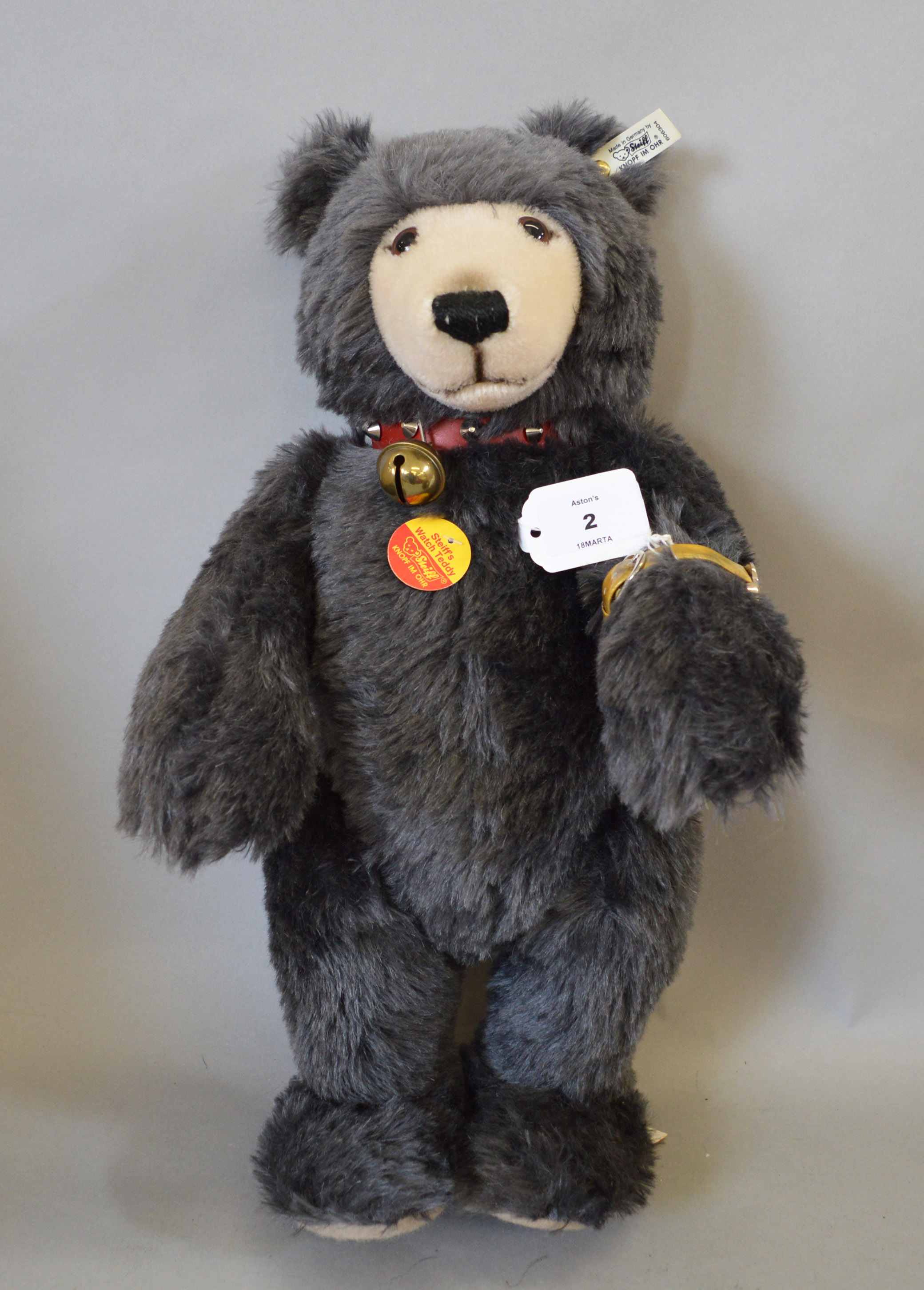 Steiff Watch Teddy, grey mohair bear wears watch and has chest label and tag. VG, unboxed.