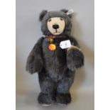 Steiff Watch Teddy, grey mohair bear wears watch and has chest label and tag. VG, unboxed.