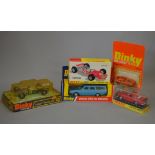 Four boxed Dinky Toys diecast models, #116 Volvo 1800S in red,