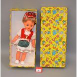 A boxed Hungarian plastic doll, 40cm tall, with sleeping eyes, overall VG,