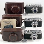 Three FED 1 Cameras. FED (1f1), 1951. FED 3.5/50, lens cap & case.