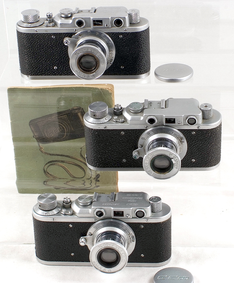 Three FED 1 Leica Copies. FED (1e1), 1942(?). FED 3.5/50, lens cap, case & manual.