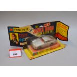 A boxed Corgi Toys 270 James Bond Aston Martin DB5 in silver with red interior and baddie figure