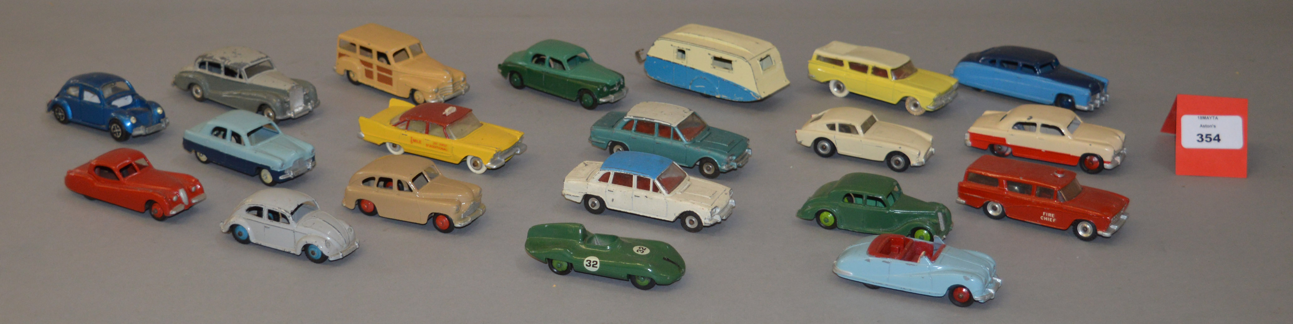 A small quantity of unboxed playworn Dinky Toys diecast model cars including 135 Triumph 2000 and