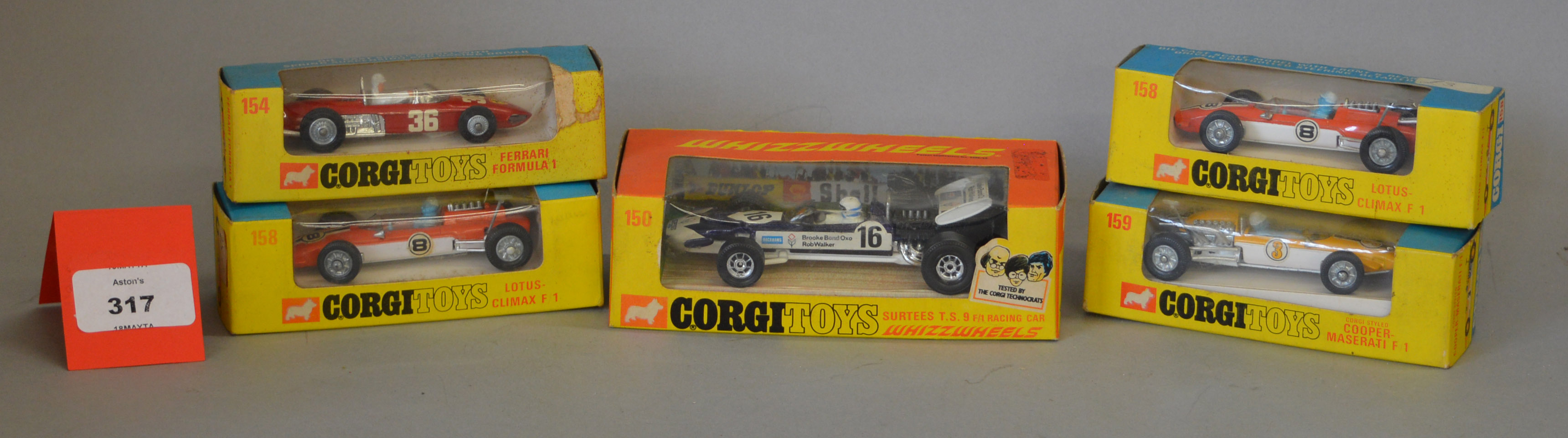 Five boxed Corgi Toys diecast model Racing Cars, 150 Surtees, 154 Ferrari,