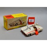 A boxed Dinky Toys 105 Maximum Security Vehicle in white with red base and stripes with Radioactive