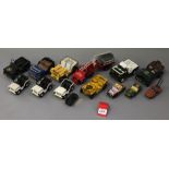 A selection of playworn unboxed tinplate Jeep models by Tri-ang, Buddy L and others,