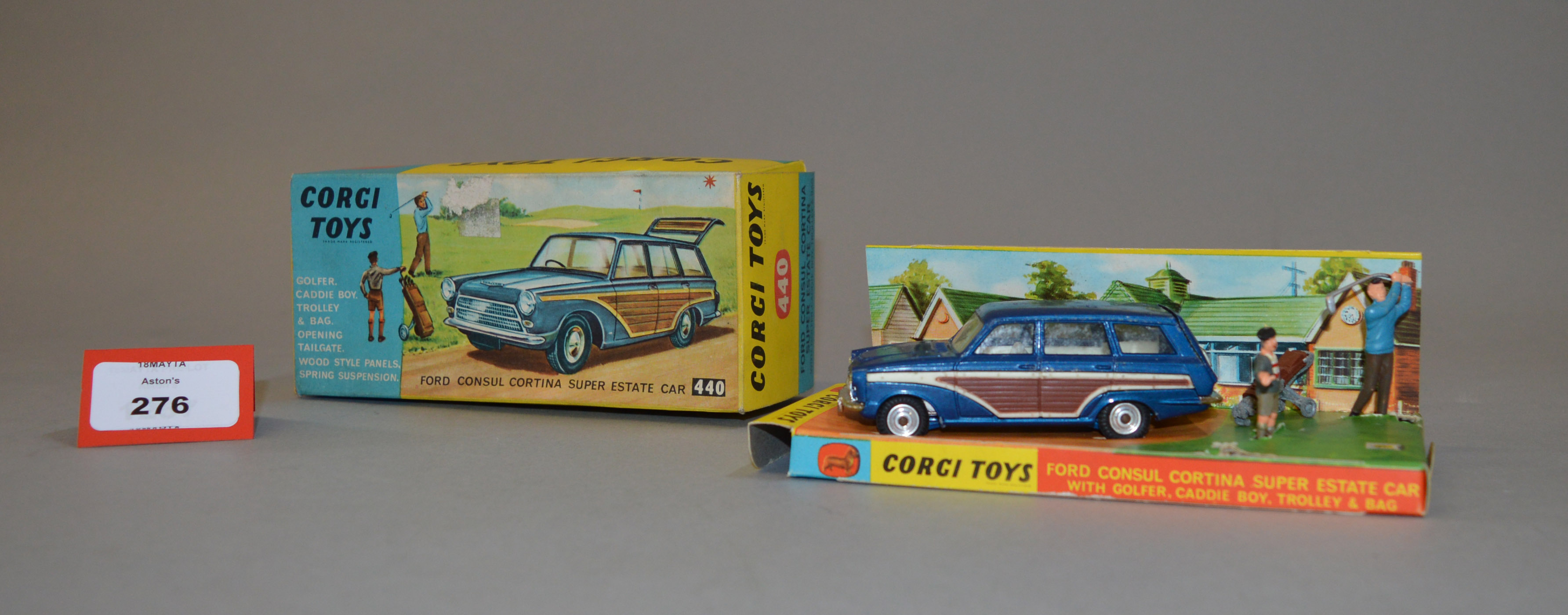 A boxed Corgi Toys 440 Ford Consul Cortina Super Estate Car in blue with golfer, caddy and gold bag,