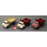 Three unboxed large scale Bedford 'S' type Tipper Truck models, approximately 23cm long.