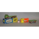 A boxed Shackleton Models mechanical Foden FG Flatbed Truck in green with red wheel arches,