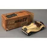 A boxed Victory Models MG TF ivory coloured plastic bodied battery operated model car,