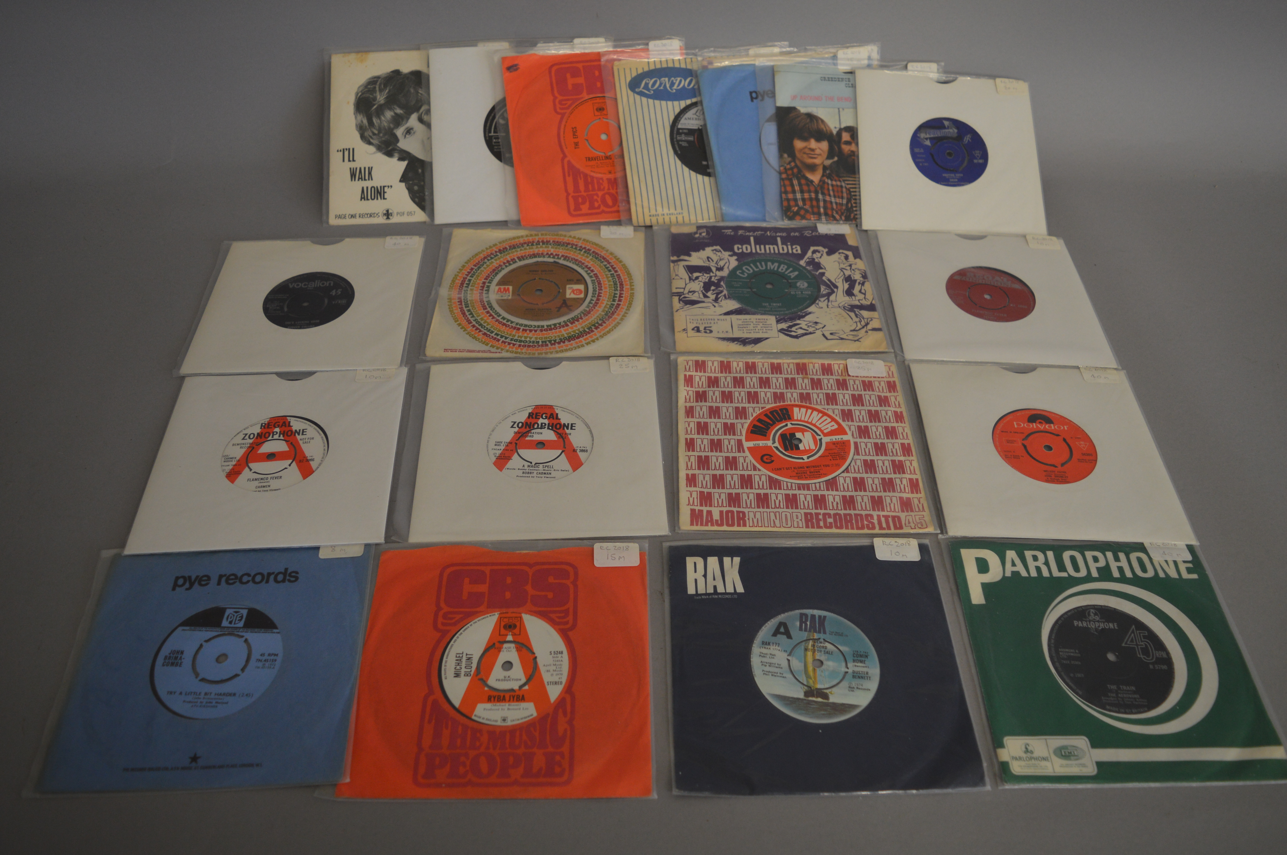 Collection of 20 rare 7 inch singles including demos mostly in original sleeves including John
