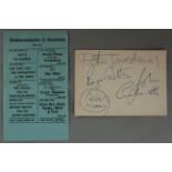 The Who signed card featuring the signatures of guitarist Pete Townshend, lead singer Roger Daltrey,