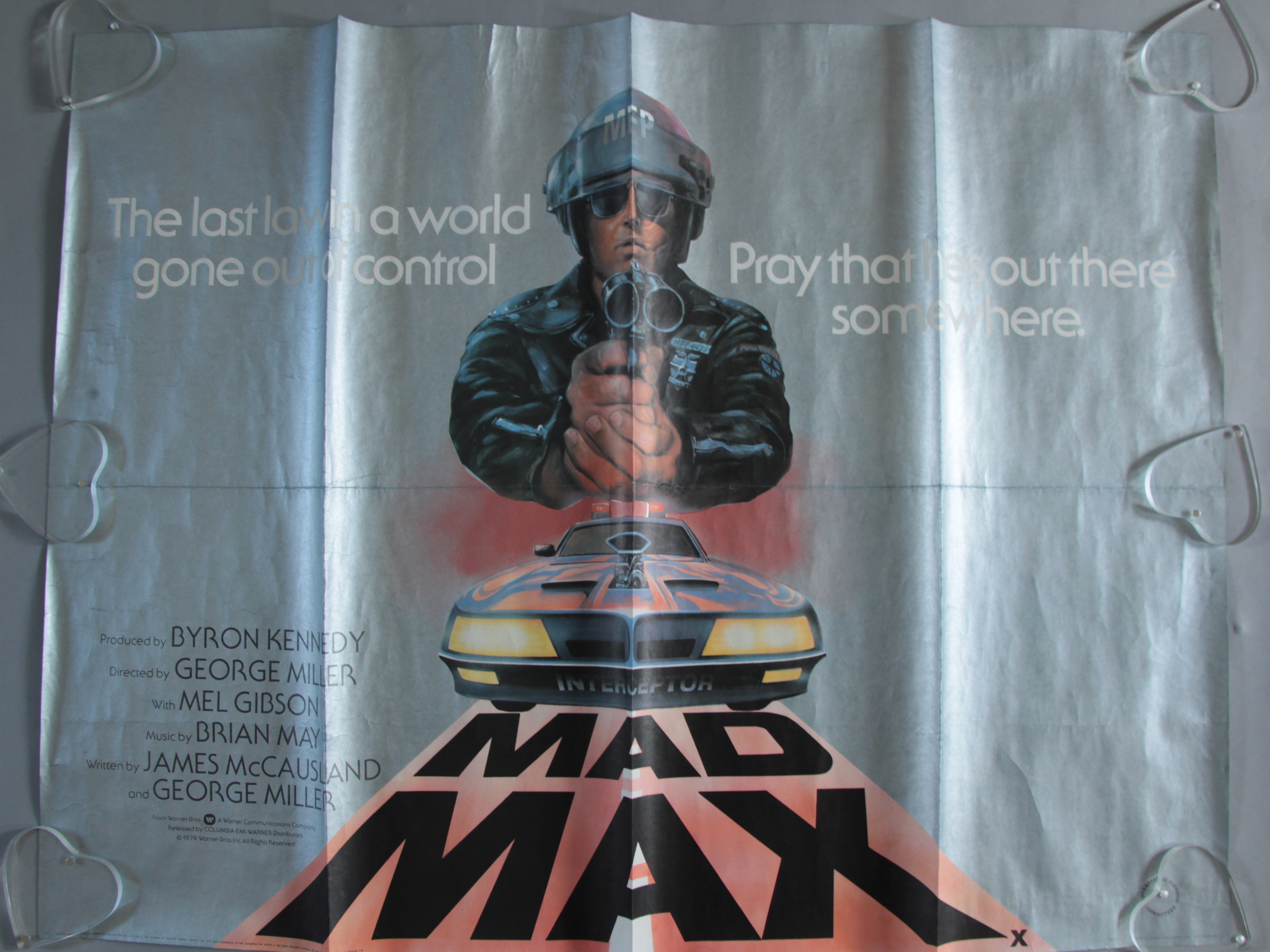 Ten vintage British Quad film posters including "Mad Max" (1979), Meteor, The 39 Steps,