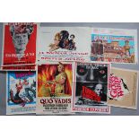 Collection of vintage film posters including Genius, Black Windmill, Black Stallion, Popeye,