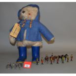 A Gabrielle Designs Paddington Bear, dressed in P blue jacket and blue wellington boots, F-G.