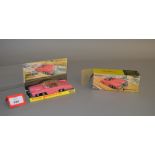 A boxed Dinky Toys 100 Lady Penelope's FAB 1, generally G with Lady Penelope figure loose in car,