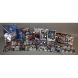 40 x modern Star Wars action figures, some on reproduction cards.