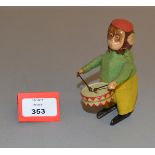 Schuco (Germany) Monkey Drummer, tinplate clockwork monkey (lacking key), dressed in red felt hat,