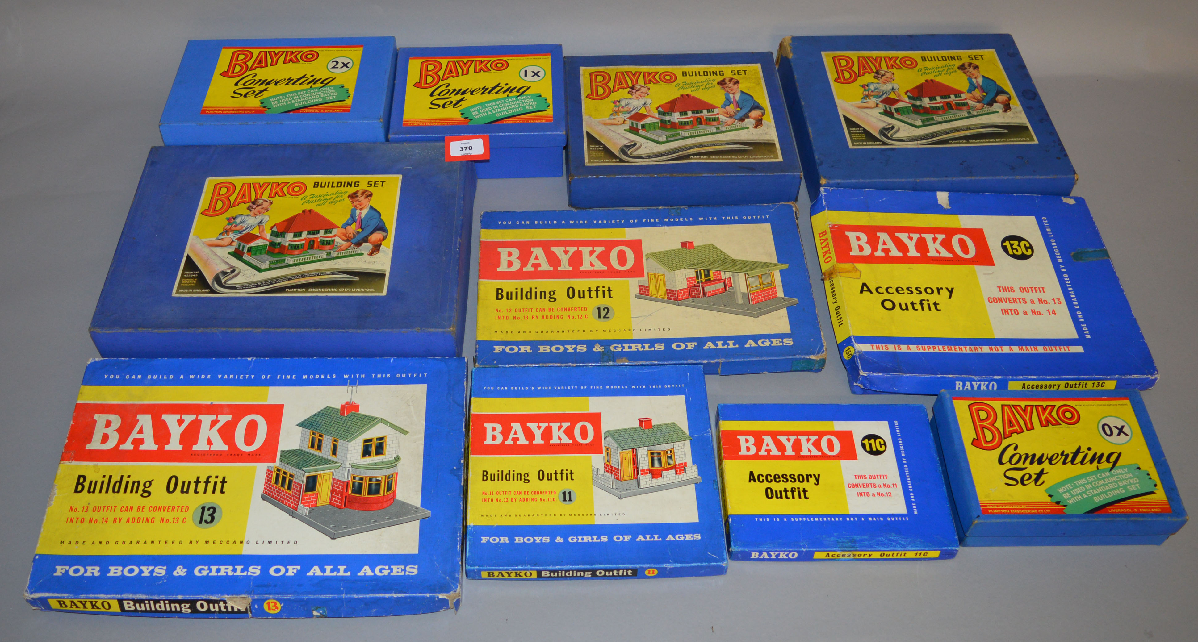 11 x Bayko Building Sets: 0; 0X; 1; 1X; 2; 2X; 11; 11C; 12; 13; 13C. All boxed.