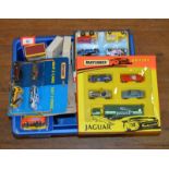 A good quantity of boxed and carded miniature diecast models by Matchbox including two and four car