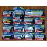 Fifteen boxed Corgi James Bond related diecast models including TY06102 Double Deck Bus and TY07201