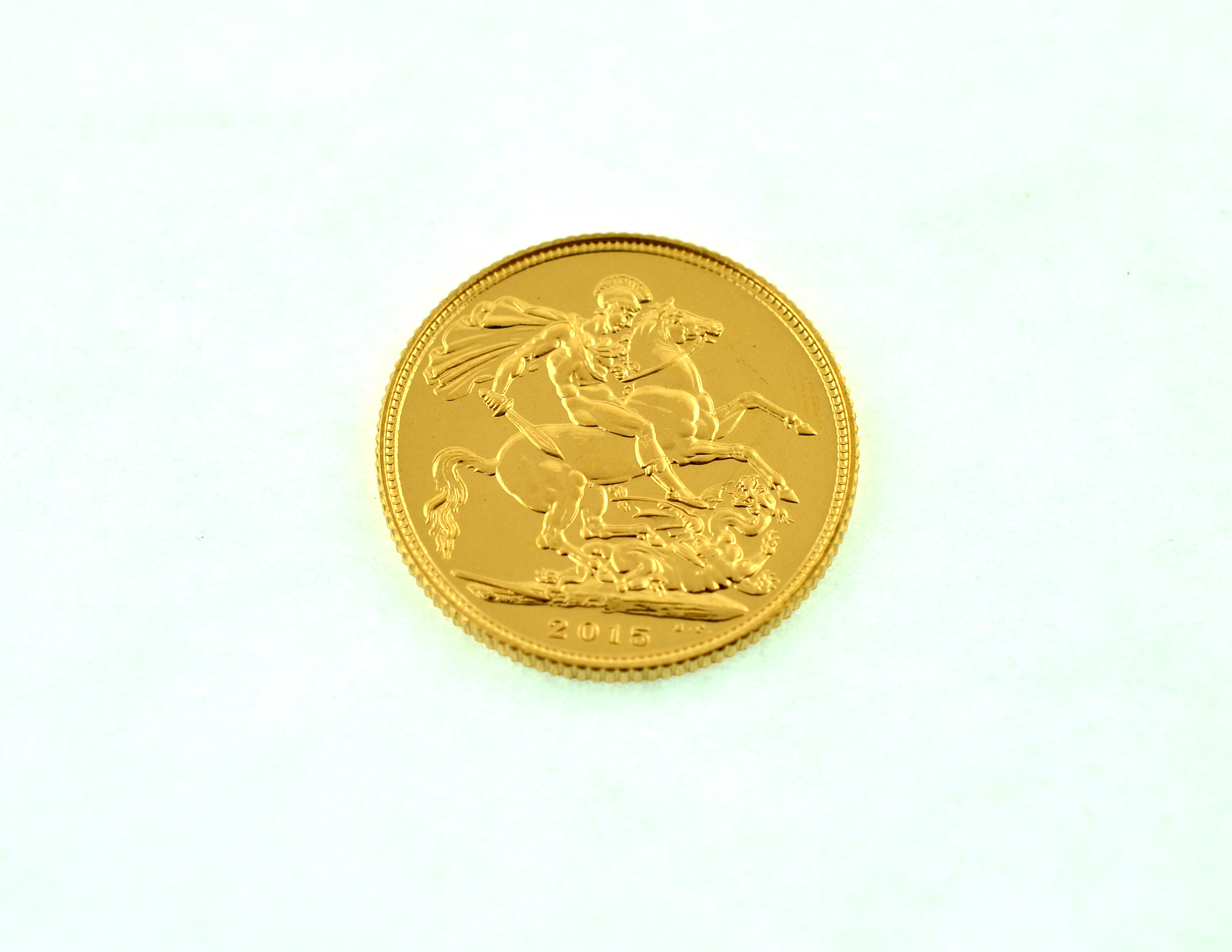 A 2015 full gold sovereign.