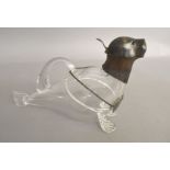 A silver sea-lion headed glass decanter (A/F glass cracked & tooth of sea-lion broken),
