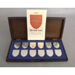A complete boxed set of silver "The Royal Coat of Arms" coins from 1195-1977 with associated
