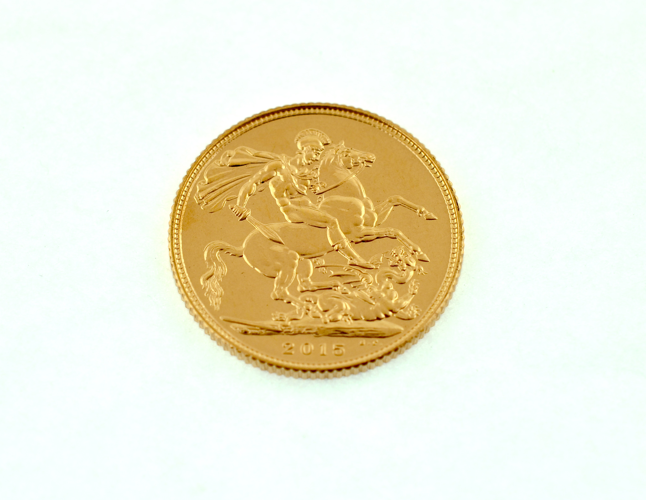 A 2015 full gold sovereign.