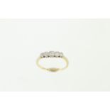 An 18ct Edwardian five stone diamond ring, approx total diamond weight 0.