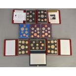 Eight Royal Mint proof coin sets (five deluxe sets)