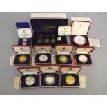 A quantity of coins, to include a 1978 boxed Jamaica $25 proof silver coin,