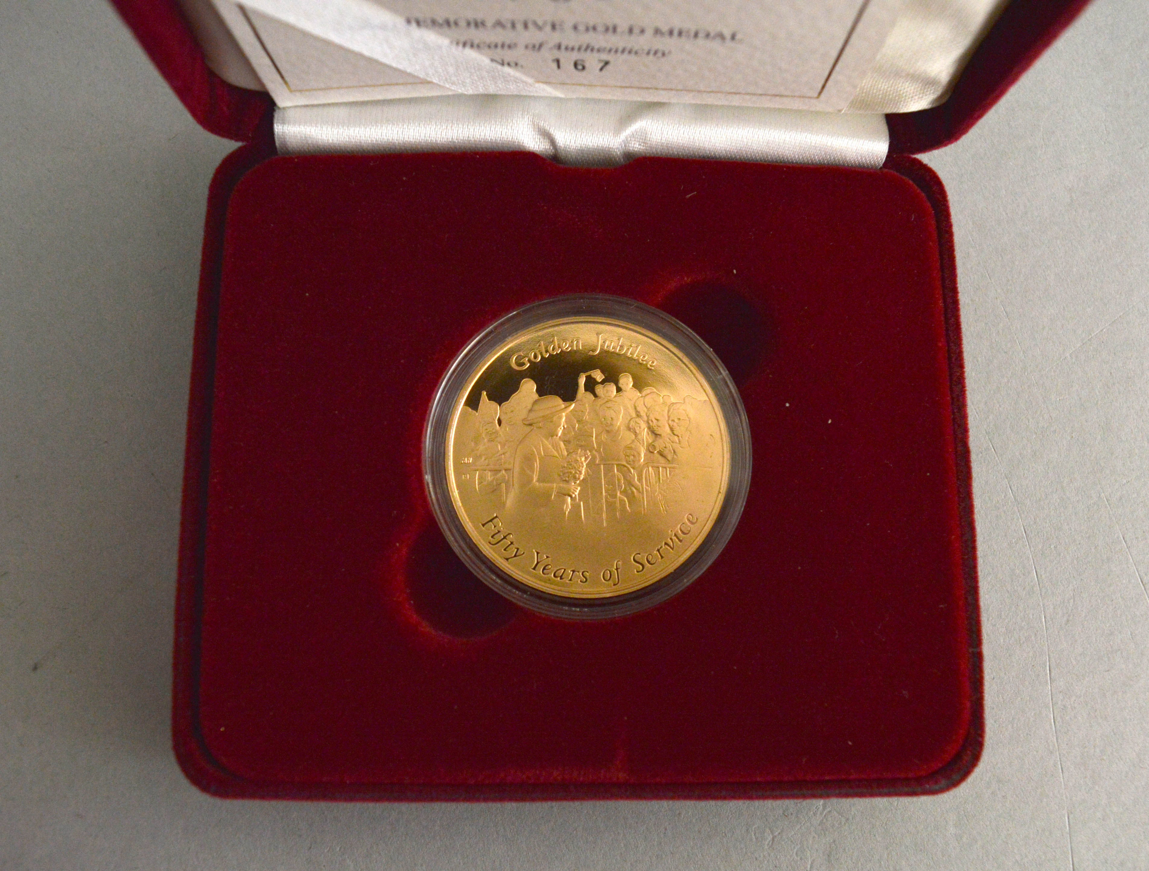 A Royal Mint 22ct gold medal commemorating The Queens Golden Jubilee, ltd edition 167 of 250, - Image 2 of 3