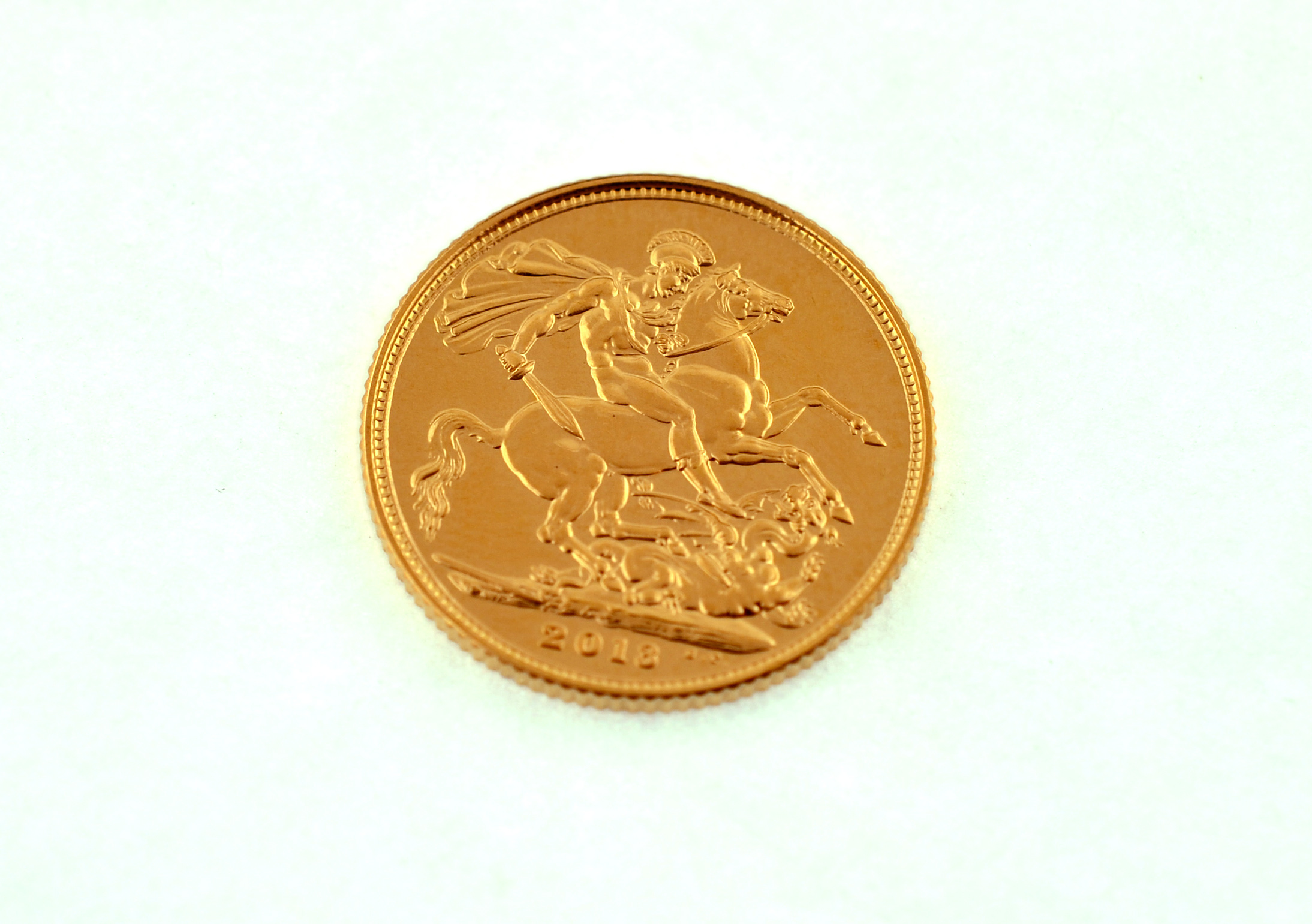 A 2013 full gold sovereign.