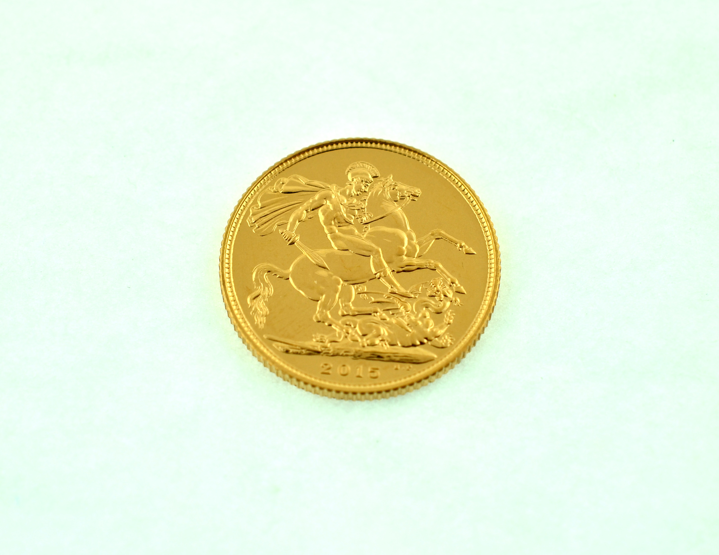 A 2015 full gold sovereign.