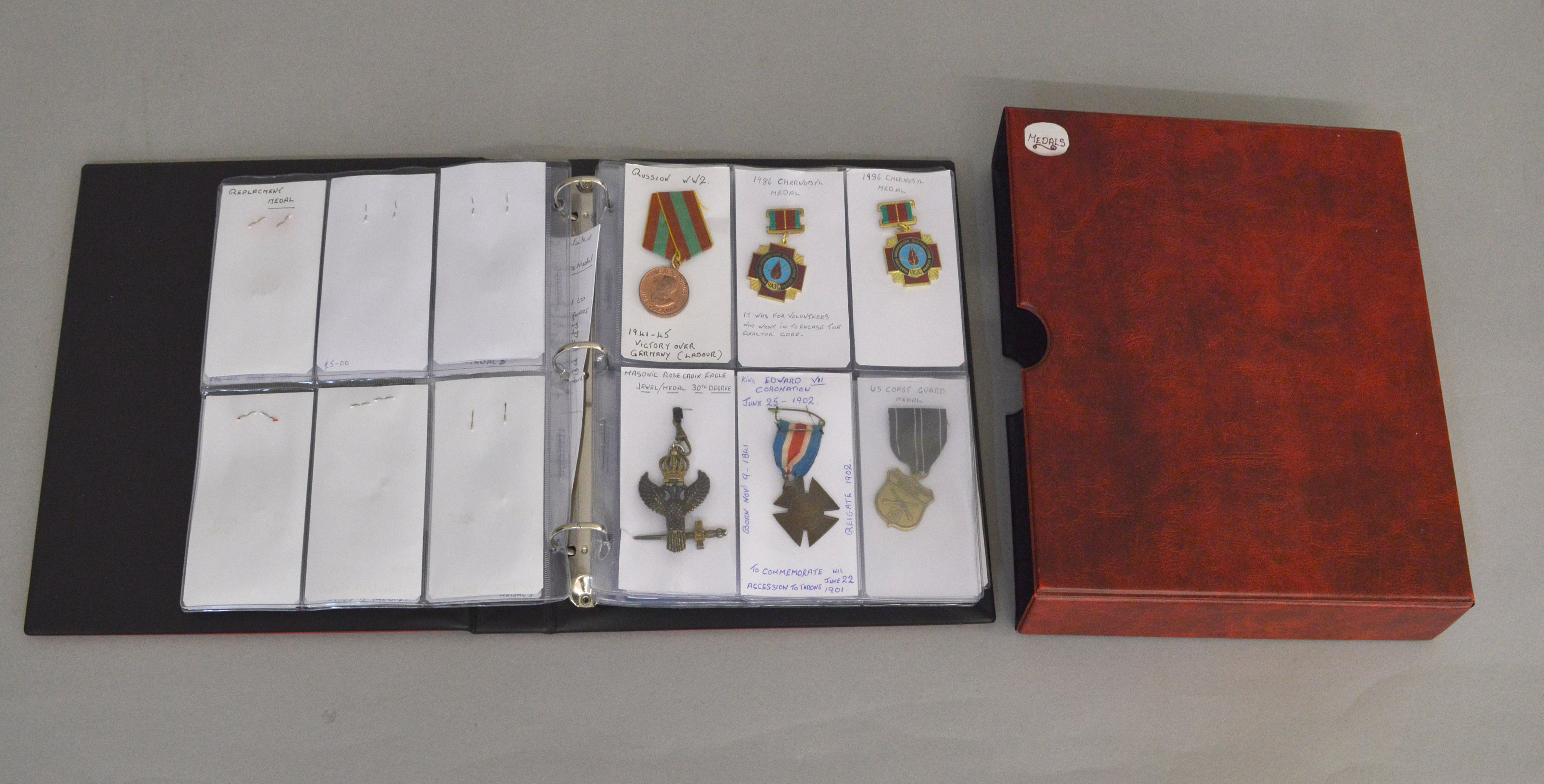 A folder of English & foreign World War I / World War II medals & medallions to include two 1st War