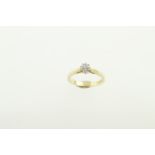 An 18ct H/M diamond solitaire ring,