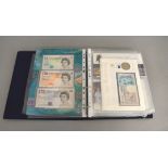 A folder to include a quantity of modern coins, notes & medallions,