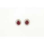 A pair of ruby & diamond earrings, H/M 9ct, approx total ruby weight 4.