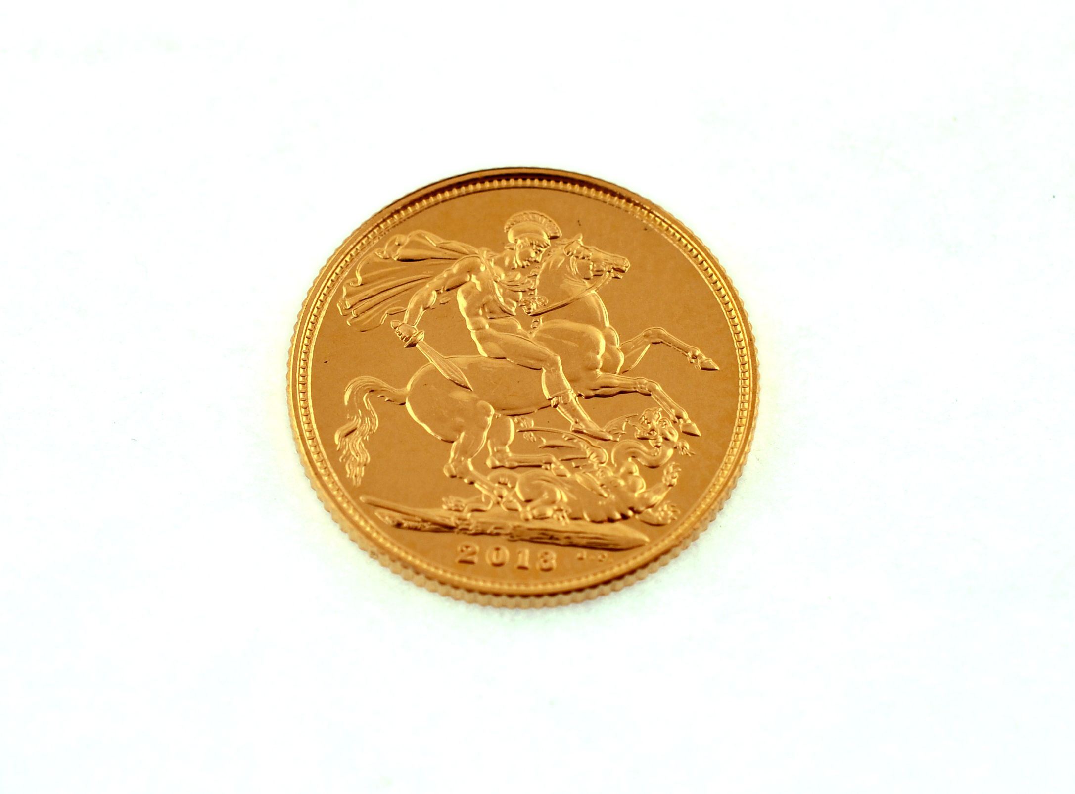 A 2013 full gold sovereign.