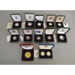 Twelve Royal Mint cased proof coins to include 1999 silver Millennium two coin set,