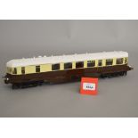 O Gauge. An electric kit-built Railcar model in chocolate and cream. .